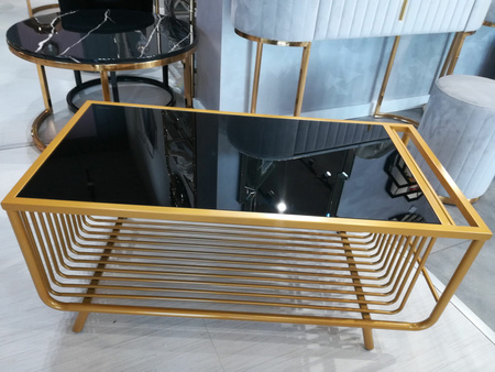 Stolik kawowy do salonu glamour Bonda miodowy 100/50cm z czarnym hartowanym szkłem TC111